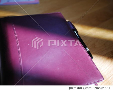 A notebook and a fountain pen, the joy of writing down time, perfect for copy space 98303884