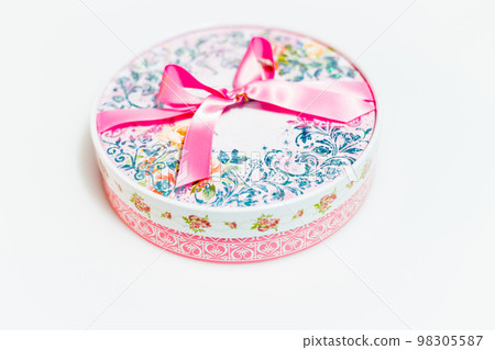 Chocolates in pink box with ribbon Chocolates in pink box with ribbon 98305587