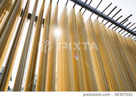 Close-up of traditional handmade noodle-making drying outdoors in Guanmiao, Tainan, Taiwan. 98307282