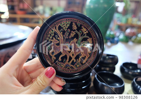 Traditional handicraft coasters from Bagan, Myanmar 98308126