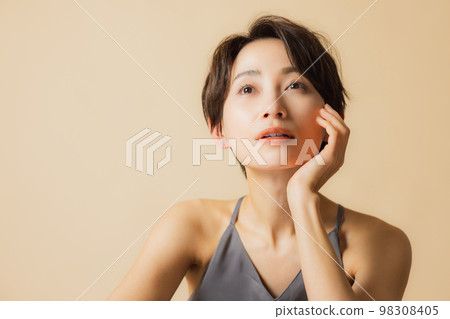 A woman with short hair A woman with short hair 98308405