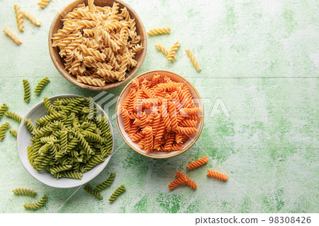 A variety of fusilli pasta from different types of legumes. Gluten-free pasta. A variety of fusilli pasta from different types of legumes. Gluten-free pasta. 98308426