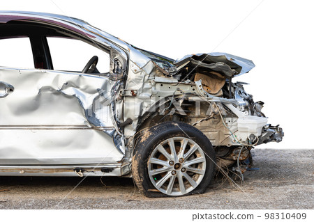 Silver car get hard damaged by accident on the road. Maintenance or car repair concept Silver car get hard damaged by accident on the road. Maintenance or car repair concept 98310409