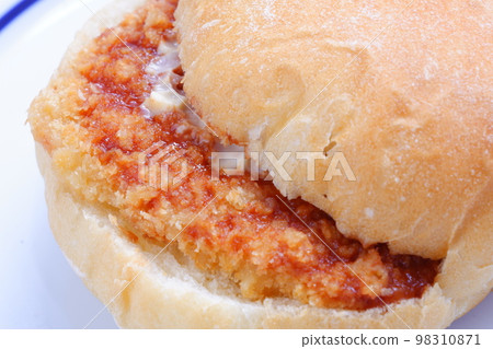 Sandwich with ham cutlet sandwiched between Kaiser Semmel bread rolls originating in Austria Sandwich with ham cutlet sandwiched between Kaiser Semmel bread rolls originating in Austria 98310871
