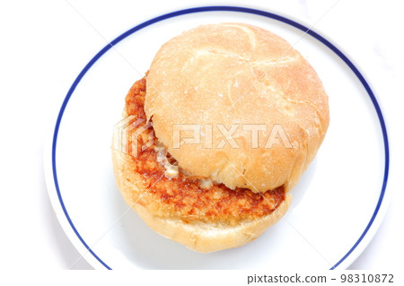 Sandwich with ham cutlet sandwiched between Kaiser Semmel bread rolls originating in Austria Sandwich with ham cutlet sandwiched between Kaiser Semmel bread rolls originating in Austria 98310872