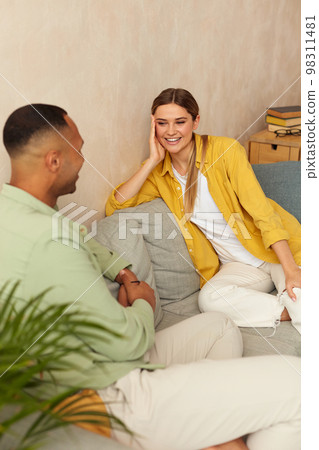 Happy Couple Talking At Sofa. Smiling Spouses Looking At Each Other And Resting 98311481