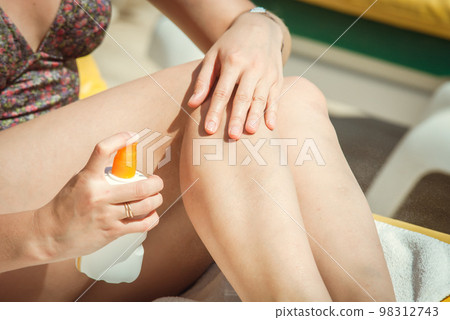 young woman sunbathing young woman sunbathing 98312743