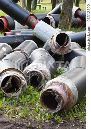 New pipes for water pipes with insulation on grass New pipes for water pipes with insulation on grass 98312800