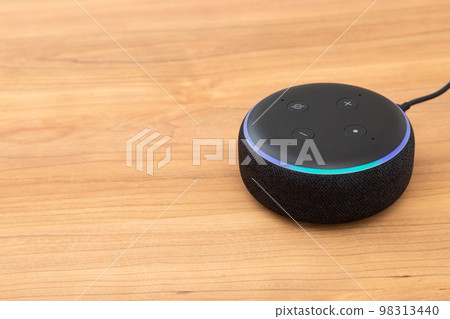 Smart speaker placed on the table 98313440