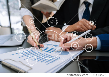 Working team meeting concept, business using laptop and smart phone and digital tablet computer with digital marketing media in virtual icon network diagram office. Working team meeting concept, business using laptop and smart phone and digital tablet computer with digital marketing media in virtual icon network diagram office. 98313528