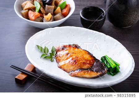 Yellowtail teriyaki and sake 98315895