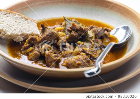 Czech beef goulash served with bread Czech beef goulash served with bread 98316026