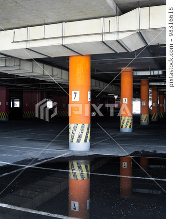 Parking under the building. 98316618