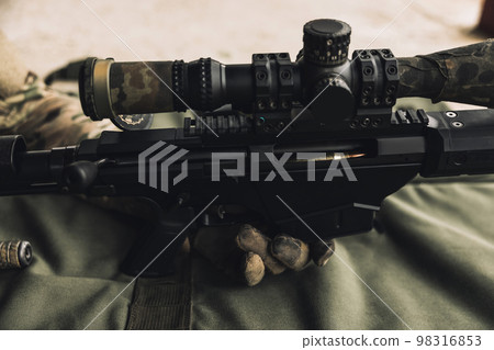 Close up picture of an optical rifle 98316853