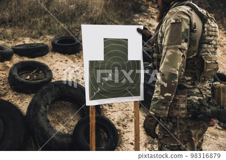 Soldier marking the target for shooting 98316879