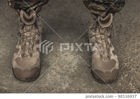 Close up picture of soldiers feet in boots 98316937