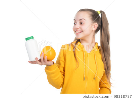 happy child choose between orange fruit and vitamin pill isolated on white, effervescent tablet. happy child choose between orange fruit and vitamin pill isolated on white, effervescent tablet. 98318757