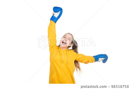 happy kid celebrate victory. winner of fight. teen girl in boxing gloves. successful child boxer 98318758