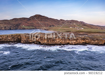 Muckross Head peninsula during sunset - about 10 km west of Killybegs village in county Donegal on the west coast of Ireland Muckross Head peninsula during sunset - about 10 km west of Killybegs village in county Donegal on the west coast of Ireland 98319212