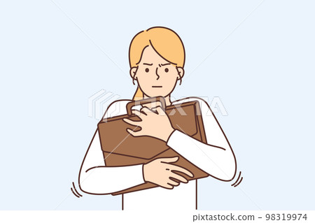 Angry businesswoman holding briefcase Angry businesswoman holding briefcase 98319974
