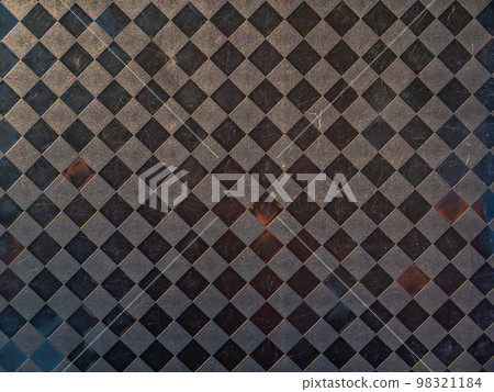 The texture of the plastic surface in black squares. 98321184