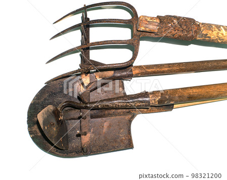 Iron garden tool with a wooden handle. Iron garden tool with a wooden handle. 98321200