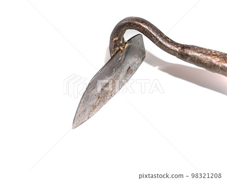 The hoe is a tool for weeding a vegetable garden. The hoe is a tool for weeding a vegetable garden. 98321208