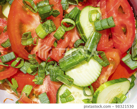 Vegetables for making fresh vegetable salad with tomatoes and cucumbers. Vegetables for making fresh vegetable salad with tomatoes and cucumbers. 98321530