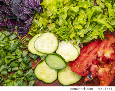 Vegetables for making fresh vegetable salad with tomatoes and cucumbers. Vegetables for making fresh vegetable salad with tomatoes and cucumbers. 98321531
