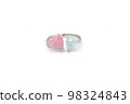 Jewelry ring, a white gold/silver plated ring decorated with a pink diamonds. An elegant diamond ring for women. 98324843