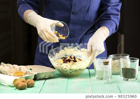 Cooking oatmeal cookies with nuts and candied fruit sweet nutritious dessert Cooking oatmeal cookies with nuts and candied fruit sweet nutritious dessert 98325960