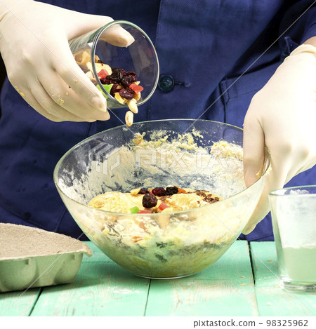 Cooking oatmeal cookies with nuts and candied fruit sweet nutritious dessert Cooking oatmeal cookies with nuts and candied fruit sweet nutritious dessert 98325962