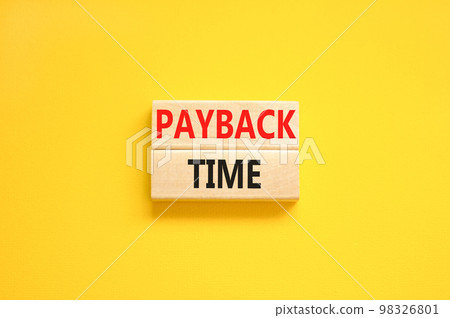 Payback time symbol. Concept words Payback time on wooden blocks. Beautiful yellow table yellow background. Business and payback time concept. Copy space. Payback time symbol. Concept words Payback time on wooden blocks. Beautiful yellow table yellow background. Business and payback time concept. Copy space. 98326801