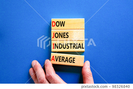 DJIA Dow Jones industrial average symbol. Concept words DJIA Dow Jones industrial average on wooden block on beautiful blue background. Business DJIA Dow Jones industrial average concept. Copy space DJIA Dow Jones industrial average symbol. Concept words DJIA Dow Jones industrial average on wooden block on beautiful blue background. Business DJIA Dow Jones industrial average concept. Copy space 98326840