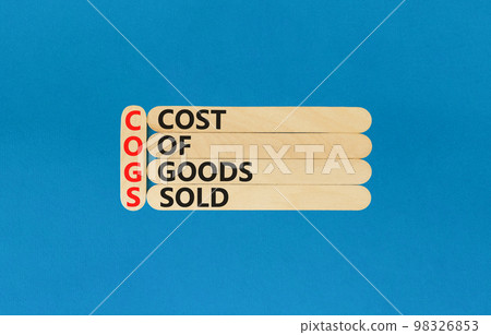 COGS cost of goods sold symbol. Concept words COGS cost of goods sold on wooden stick on beautiful blue background. Business COGS cost of goods sold concept. Copy space. COGS cost of goods sold symbol. Concept words COGS cost of goods sold on wooden stick on beautiful blue background. Business COGS cost of goods sold concept. Copy space. 98326853