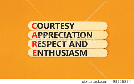 CARE symbol. Concept words CARE courtesy appreciation respect and enthusiasm on wooden stick on beautiful orange background. Business CARE courtesy appreciation respect enthusiasm concept. Copy space. CARE symbol. Concept words CARE courtesy appreciation respect and enthusiasm on wooden stick on beautiful orange background. Business CARE courtesy appreciation respect enthusiasm concept. Copy space. 98326854