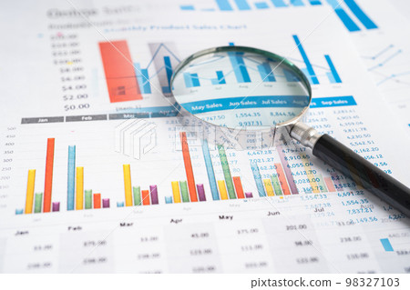 Magnifying glass on charts graphs paper. Financial development, Banking Account, Statistics, Investment Analytic research data economy, Stock exchange trading, Business office company meeting concept. Magnifying glass on charts graphs paper. Financial development, Banking Account, Statistics, Investment Analytic research data economy, Stock exchange trading, Business office company meeting concept. 98327103