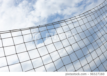 Volleyball net with blue sky for background design 98327160