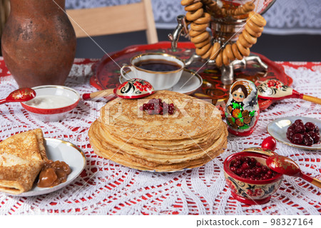 Pancakes with berries and sour cream Pancakes with berries and sour cream 98327164