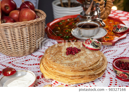 Pancakes with berries and sour cream Pancakes with berries and sour cream 98327166
