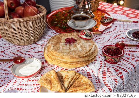 Pancakes with berries and sour cream Pancakes with berries and sour cream 98327169