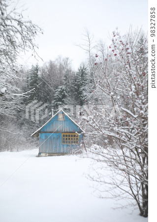 winter landscape panorama with wooden house in the forest. Snow covered hut. Christmas holiday and winter vacations concept winter landscape panorama with wooden house in the forest. Snow covered hut. Christmas holiday and winter vacations concept 98327858