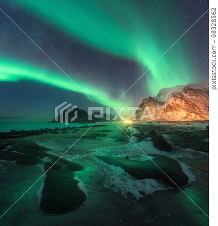 Aurora borealis above Uttakleiv beach in Lofoten islands, Norway 98328562