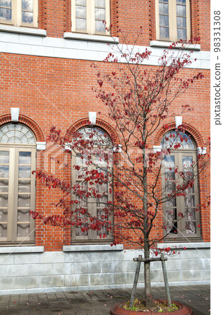 Red brick wall and western window Red brick wall and western window 98331308