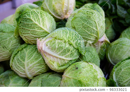 Fresh organic salad and cabbage in greengrocery shop 98333021