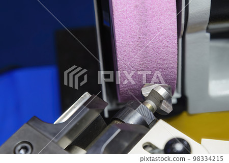 The chamfer tool regrinding process with abrasive stone wheel . 98334215