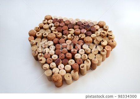 Wine corks diamond shaped composition isolated on white background Wine corks diamond shaped composition isolated on white background 98334300