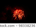 Red Firework Lights Up the Sky 98338236