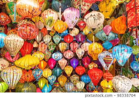 Colorful lanterns at night market in Hoi An ancient town in central Vietnam, landmark and popular for tourist attractions. Vietnam and Southeast Asia travel concept 98338704