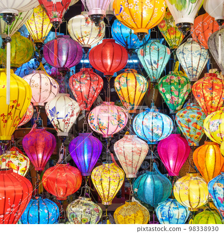 Colorful lanterns at night market in Hoi An ancient town in central Vietnam, landmark and popular for tourist attractions. Vietnam and Southeast Asia travel concept Colorful lanterns at night market in Hoi An ancient town in central Vietnam, landmark and popular for tourist attractions. Vietnam and Southeast Asia travel concept 98338930